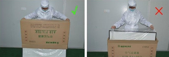 把高效過濾器慢慢倒出來，把紙箱放一邊查看高效過濾器是否損壞